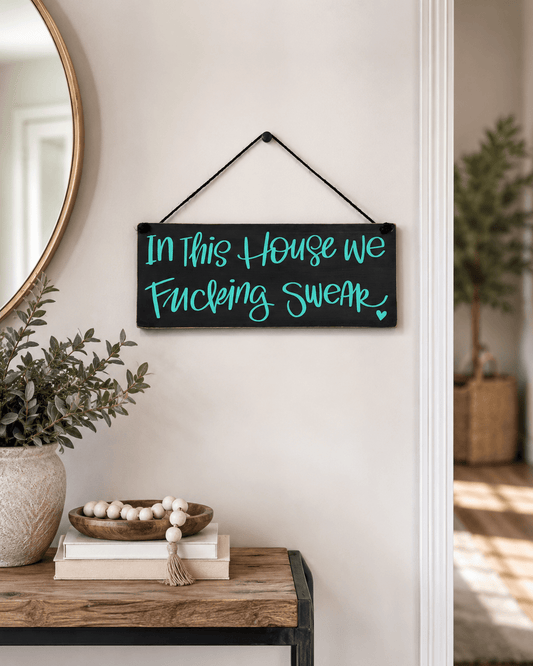 IN THIS HOUSE WE SWEAR SIGN - Evolve Supply Co. Evolve Supply Co.